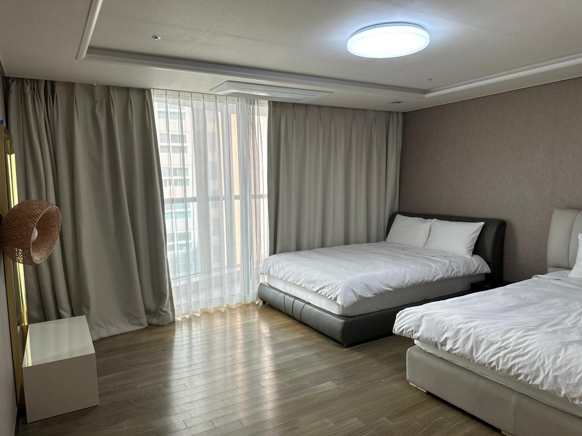 Апартаменты Haeundae Luxury House Пусан Экстерьер фото